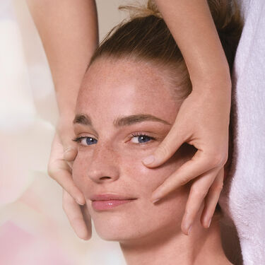 Women with cleanser on their faces 