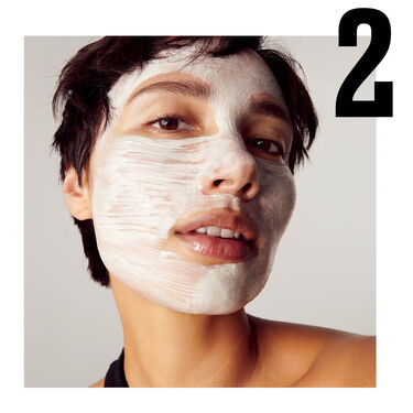 hands holding cleansers hands holding cleansers