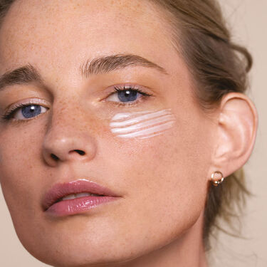 Women with cleanser on their faces 