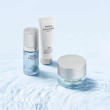hands holding cleansers