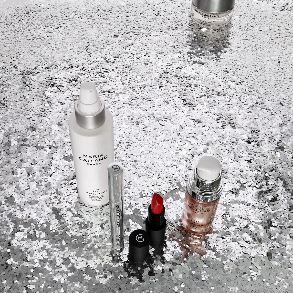 hands holding cleansers